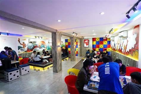 dots board game cafe menyajikan ATM Nikmat desain modern info image 1